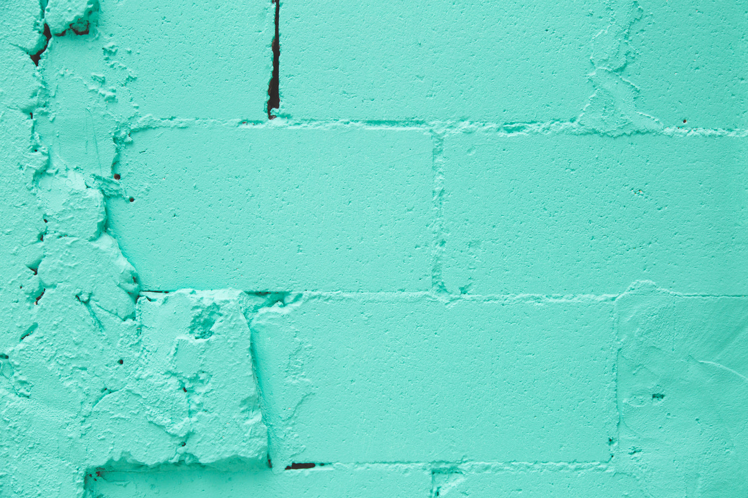 Old Turquoise Paint on Cinder Block Wall