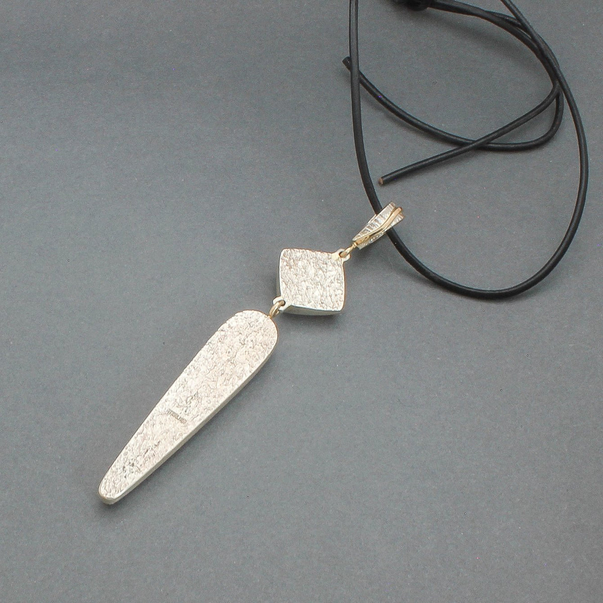 Elongated Contemporary Pendant of Rosarita and Black Jade by Duane Maktima - Turquoise & Tufa