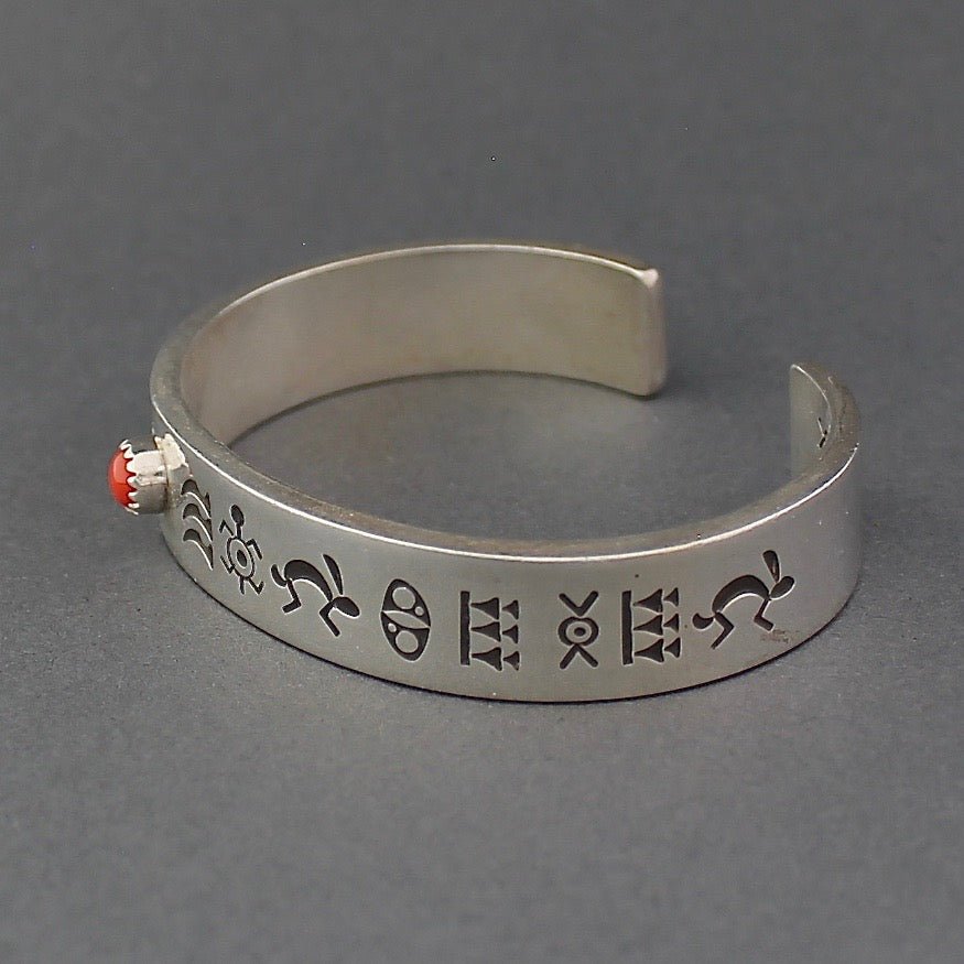 Norbert Peshlakai Silver Stamped Bracelet With Coral Cab - Turquoise & Tufa