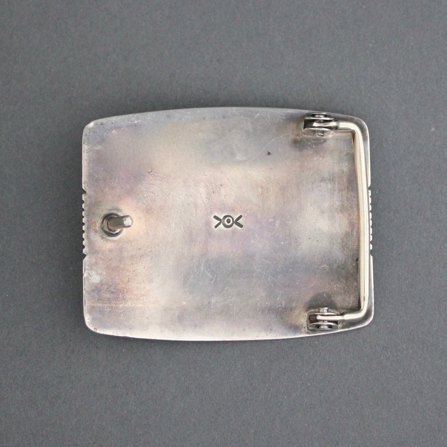 Silver Buckle By Norbert Peshlakai "Feathered Warrior II" - Turquoise & Tufa