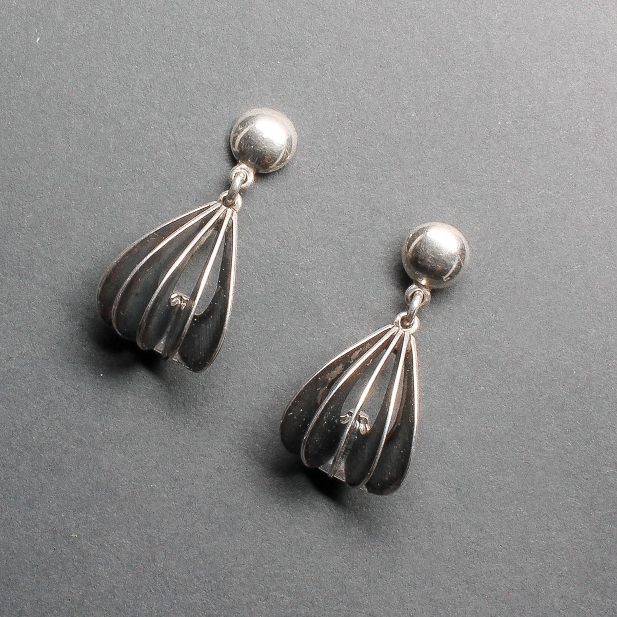 Silver Dangle Earrings by James Bahe - Turquoise & Tufa