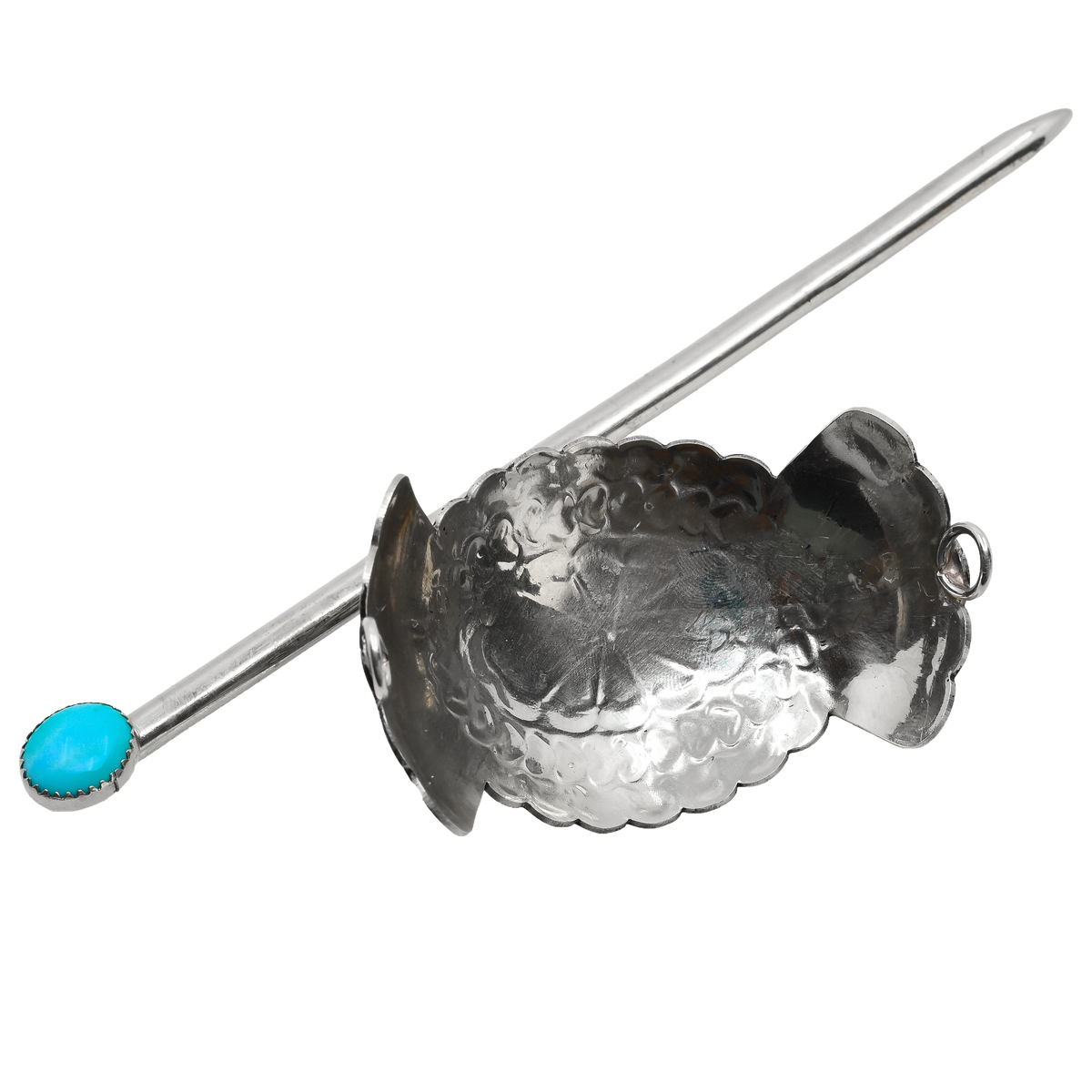 A sterling silver Navajo hair ornament and stick. The ornament features a scalloped silver design set with turquoise, and the accompanying stick is topped with a round turquoise cabochon in a bezel setting.