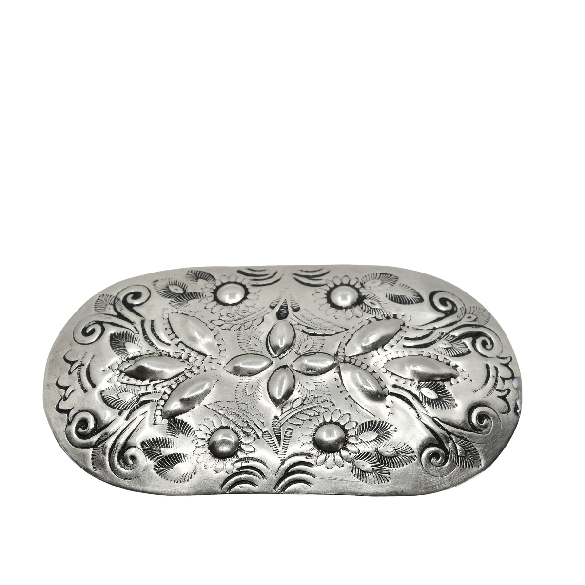An Oval Silver Navajo Hair Barrette with decorations of Leaf and Flower Stamp work and Repousse