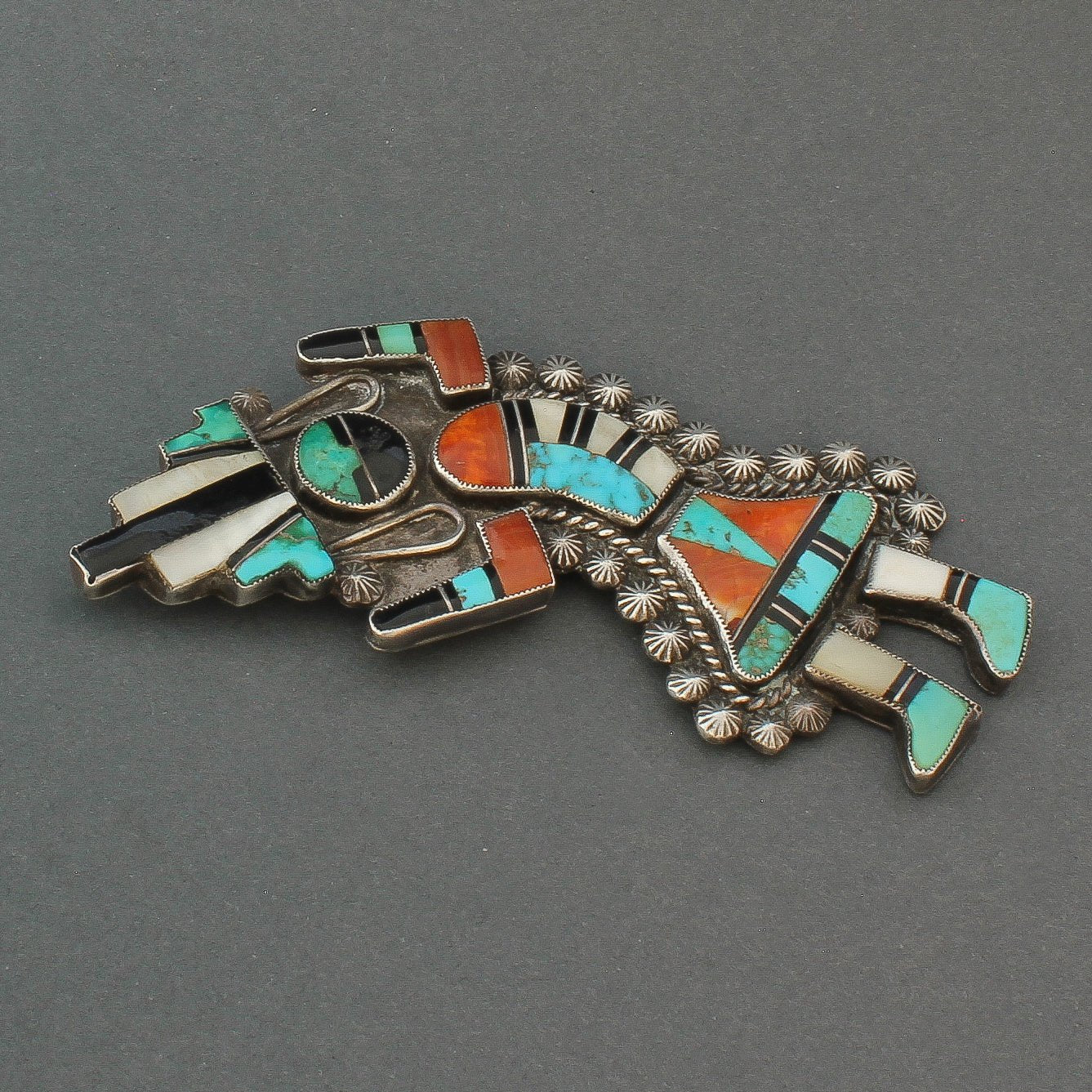 Large Zuni Rainbow Man Pin of Inlay Circa 1945 – Turquoise & Tufa